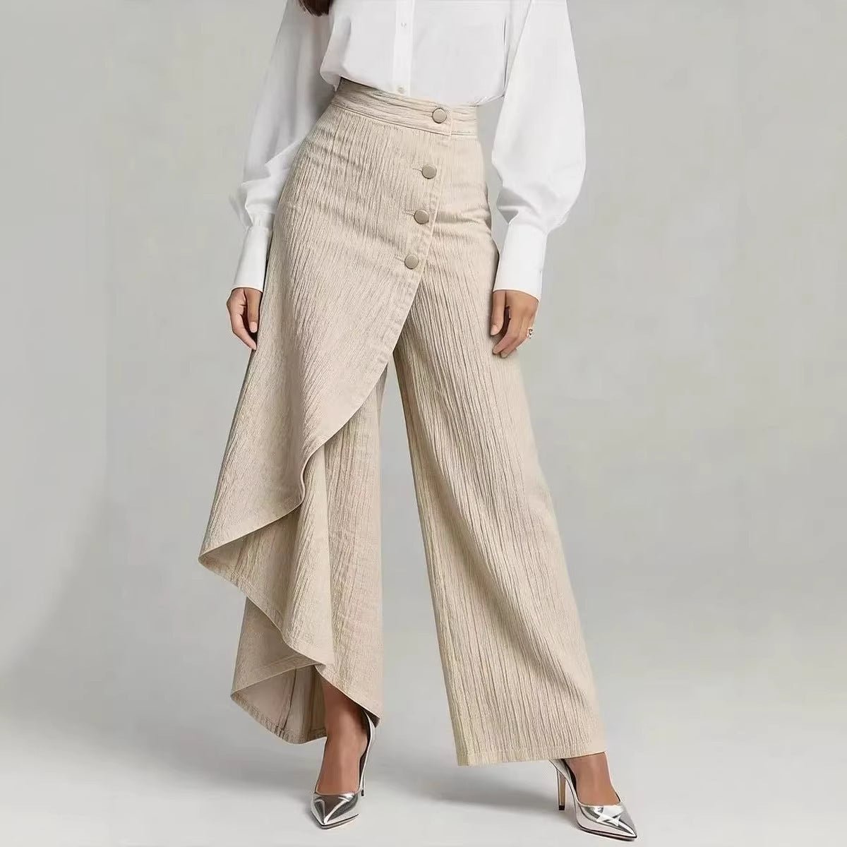 Ancient Energy women's straight-leg faux jeans with large ruffled buttons and stylish design, shown on a model.