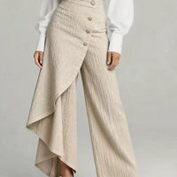 Ancient Energy women's faux jeans featuring straight-leg fit, large ruffled buttons, and stylish design with ruffled details.