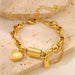 Ancient Energy titanium bracelet featuring a heart-shaped pendant, sleek and versatile jewelry design.
