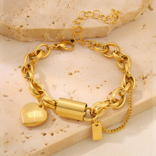 Titanium bracelet with a heart-shaped pendant from Ancient Energy, featuring a sleek, versatile design suitable for daily wear.