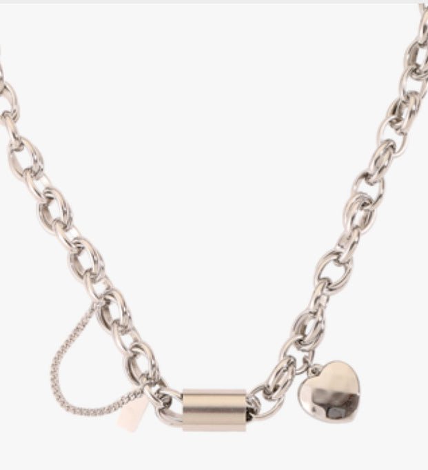 Ancient Energy titanium bracelet featuring a heart-shaped pendant, stylish and versatile jewelry accessory.