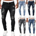 Vintage wash skinny jeans for men by Ancient Energy, featuring casual street style denim trousers with a modern fit.