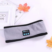 Wireless Bluetooth headband by Ancient Energy, designed for outdoor fitness and yoga, with built-in headphones and comfortable fit.