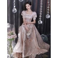 Elegant women’s champagne evening dress by Ancient Energy, featuring a flowing design perfect for formal occasions.