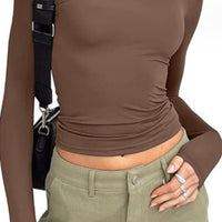 Slim fit women's long-sleeved pullover top by Ancient Energy, solid casual shirt with a sleek, fashionable design.