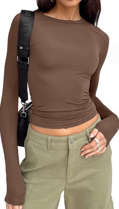 Slim fit women's long-sleeved pullover top by Ancient Energy, solid casual shirt with a sleek, fashionable design.