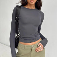 Women's slim long-sleeved pullover top by Ancient Energy, solid casual fit shirt ideal for stylish everyday wear.