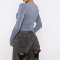 Slim fit women's long-sleeved pullover top by Ancient Energy, solid casual shirt with a stylish, comfortable design.