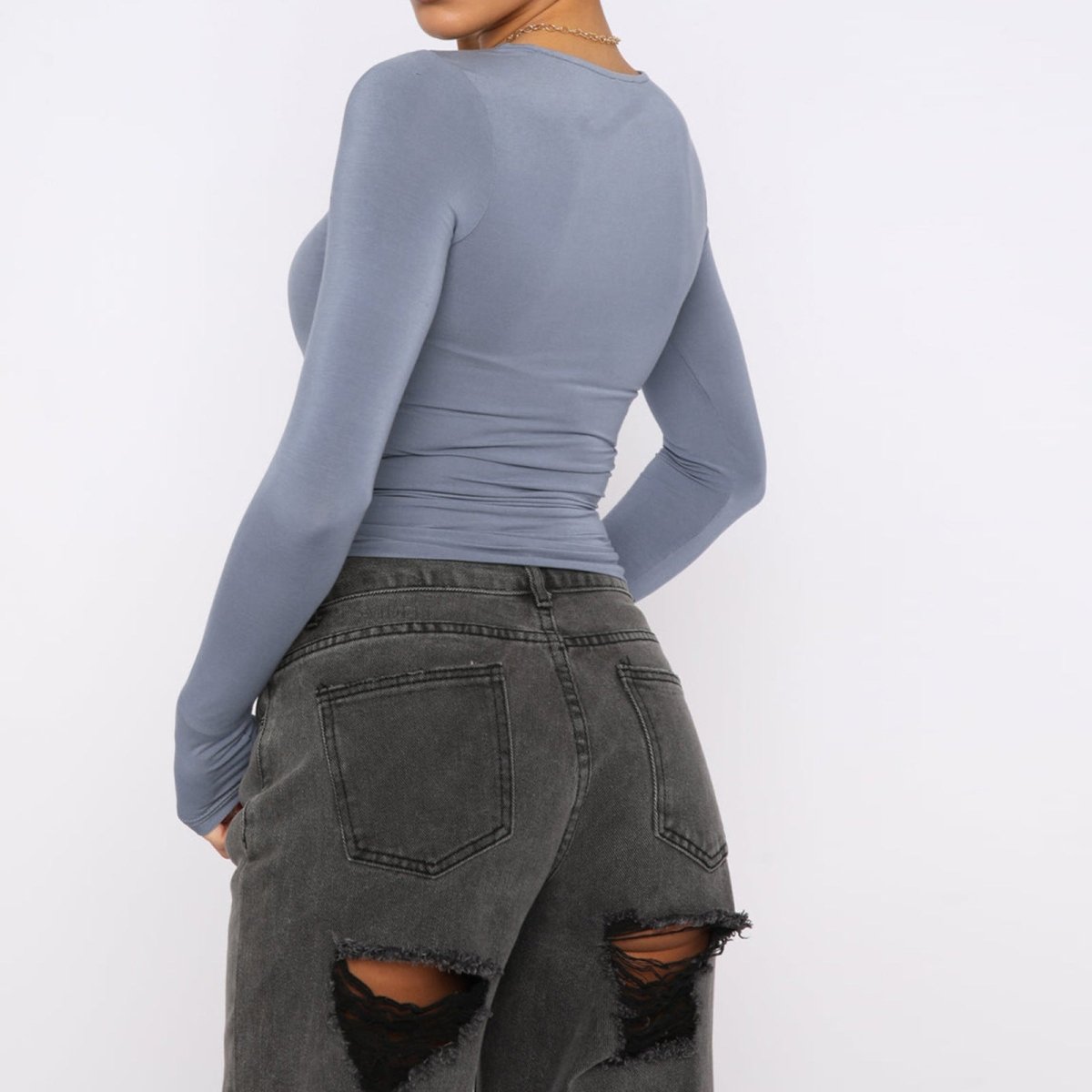 Slim fit women's long-sleeved pullover top by Ancient Energy, solid casual shirt with a stylish, comfortable design.