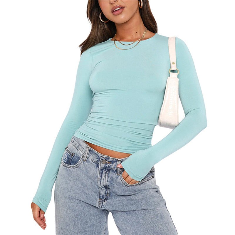 Ancient Energy women's long-sleeved pullover top with a slim fit, solid casual style, perfect for everyday wear.