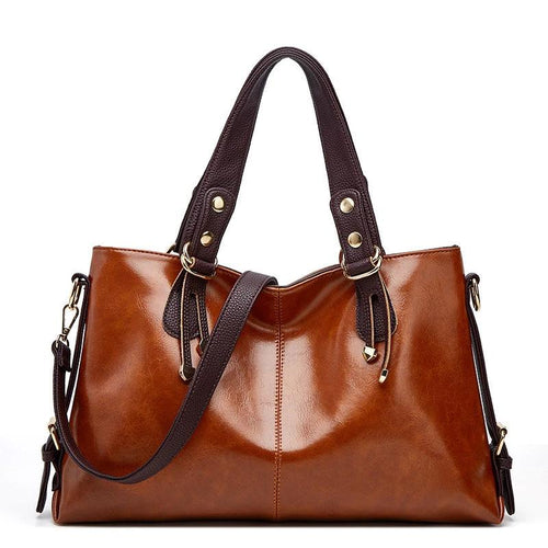 Large soft leather women's shoulder messenger handbag by Ancient Energy with spacious interior and adjustable strap.