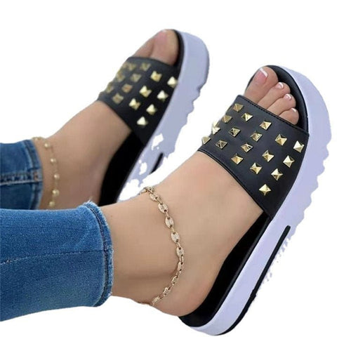 Women's Ancient Energy wedge and rivet beach flip-flops with comfortable straps and stylish design, perfect for summer outings.