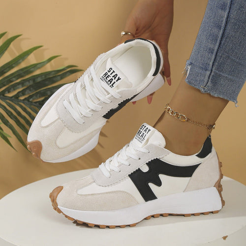 Women's chunky-soled sneakers by Ancient Energy with lace-up design and casual style, shown in a neutral color.