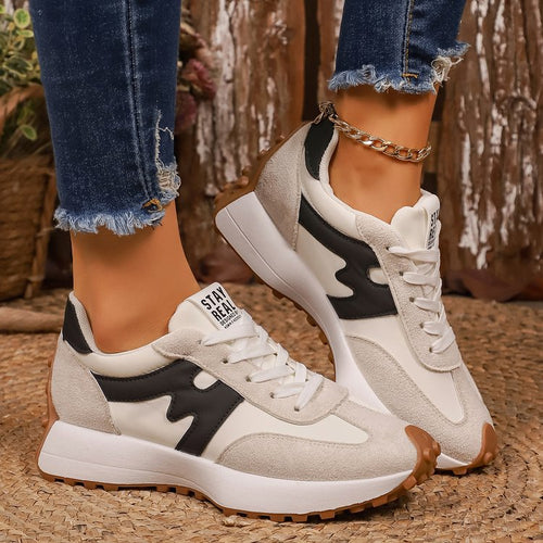 Ancient Energy women's chunky-soled sneakers with lace-up design and casual style, shown from a side angle.