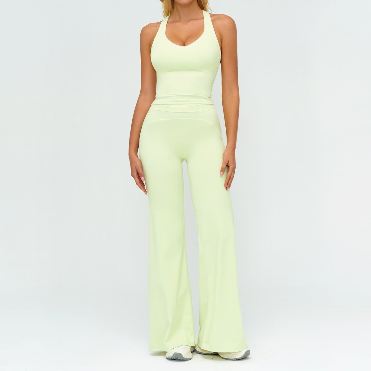 Ancient Energy women's yoga set with V-neck sleeveless top and slim straight pants, perfect for summer gym and sports activities.