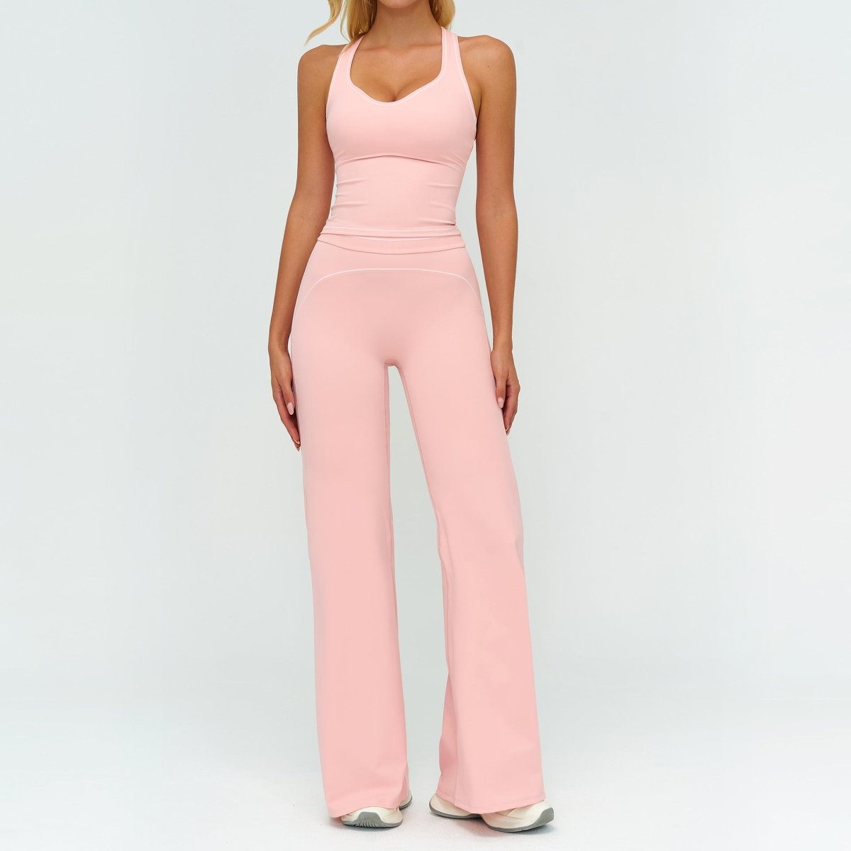 Ancient Energy women's yoga set with V-neck sleeveless top and slim straight pants for summer gym and sports activities.