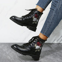 Ancient Energy women's high-top workwear boots with large Halloween cartoon print and playful pattern.
