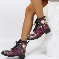 Ancient Energy women's high top workwear boots with large Halloween cartoon print and colorful pattern.