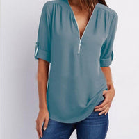 Ancient Energy women's short sleeve Zip V-neck shirt with a loose fit, casual style, and lightweight fabric.