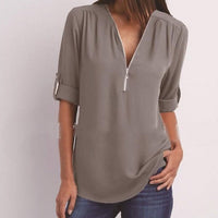 Ancient Energy women's short sleeve zip V-neck shirt, loose fit top with a relaxed style, ideal for casual wear.