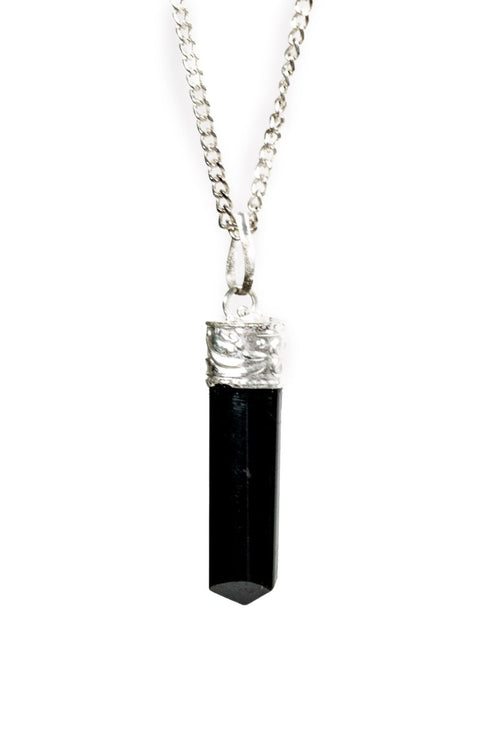 Silver-plated Black Tourmaline Protection Pendant from Ancient Energy, featuring a polished black stone on a sleek silver chain.