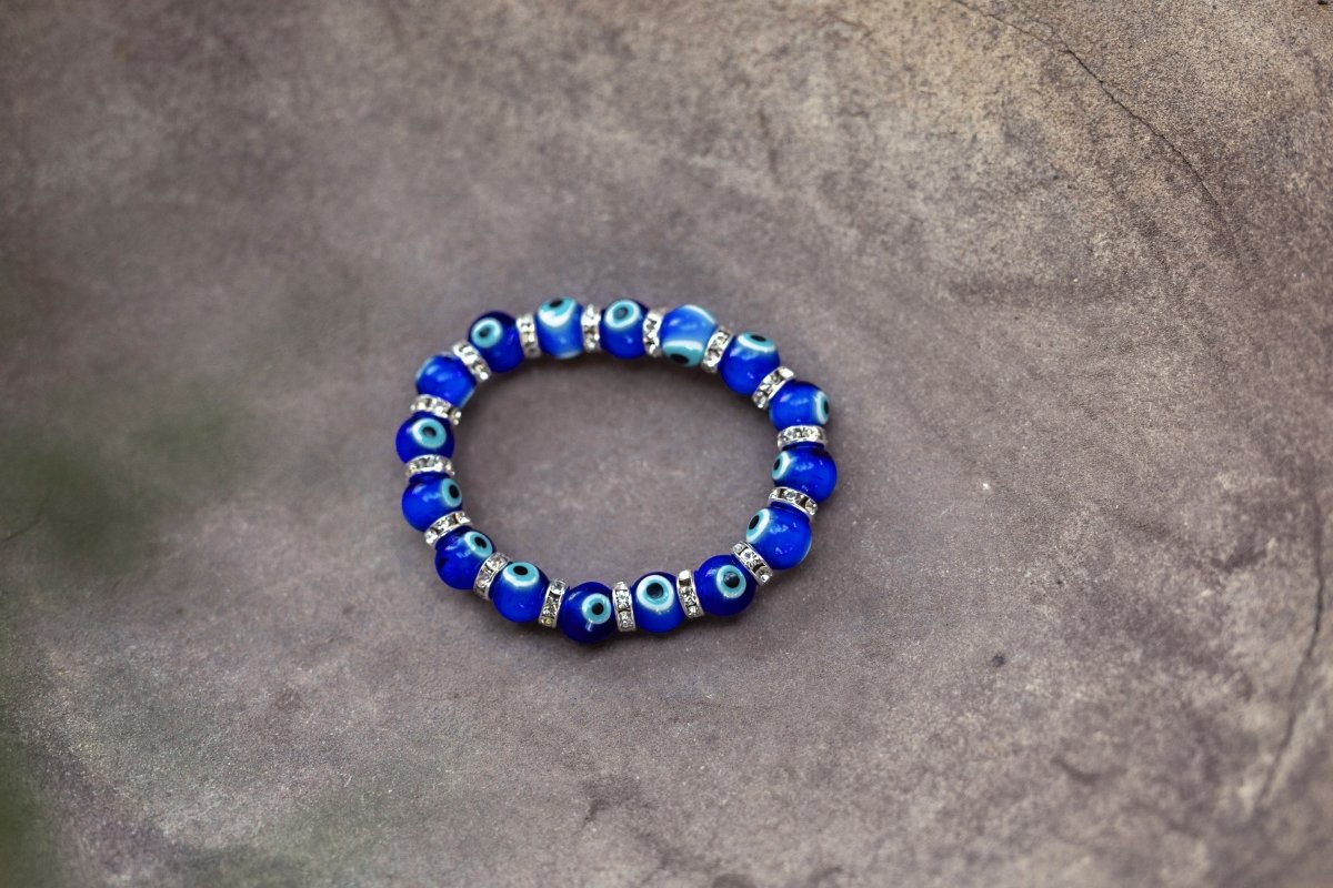 Ancient Energy Evil Eye Protection Bracelet with blue and white beads, designed to ward off negative energy.