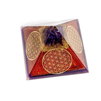 Ancient Energy Flower of Life copper orgone pyramid with amethyst crystal, featuring intricate design and vibrant purple gemstone.