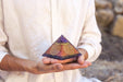 Authentic Flower of Life Copper Orgone Pyramid with Amethyst from Ancient Energy, featuring intricate design and polished copper surface.