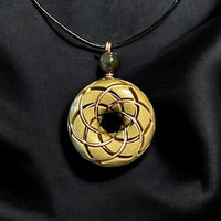 Brass Torus Vortex Pendant with Libyan Desert Glass orgonite necklace featuring Rodin coil design by Ancient Energy.