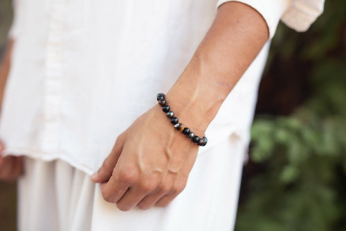 Ancient Energy triple protection bracelet with tiger's eye, hematite, and obsidian beads, 7.5 inches long.