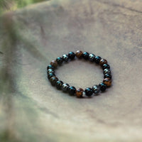 Ancient Energy triple protection bracelet with tiger's eye, hematite, and obsidian beads, 7.5 inches long.