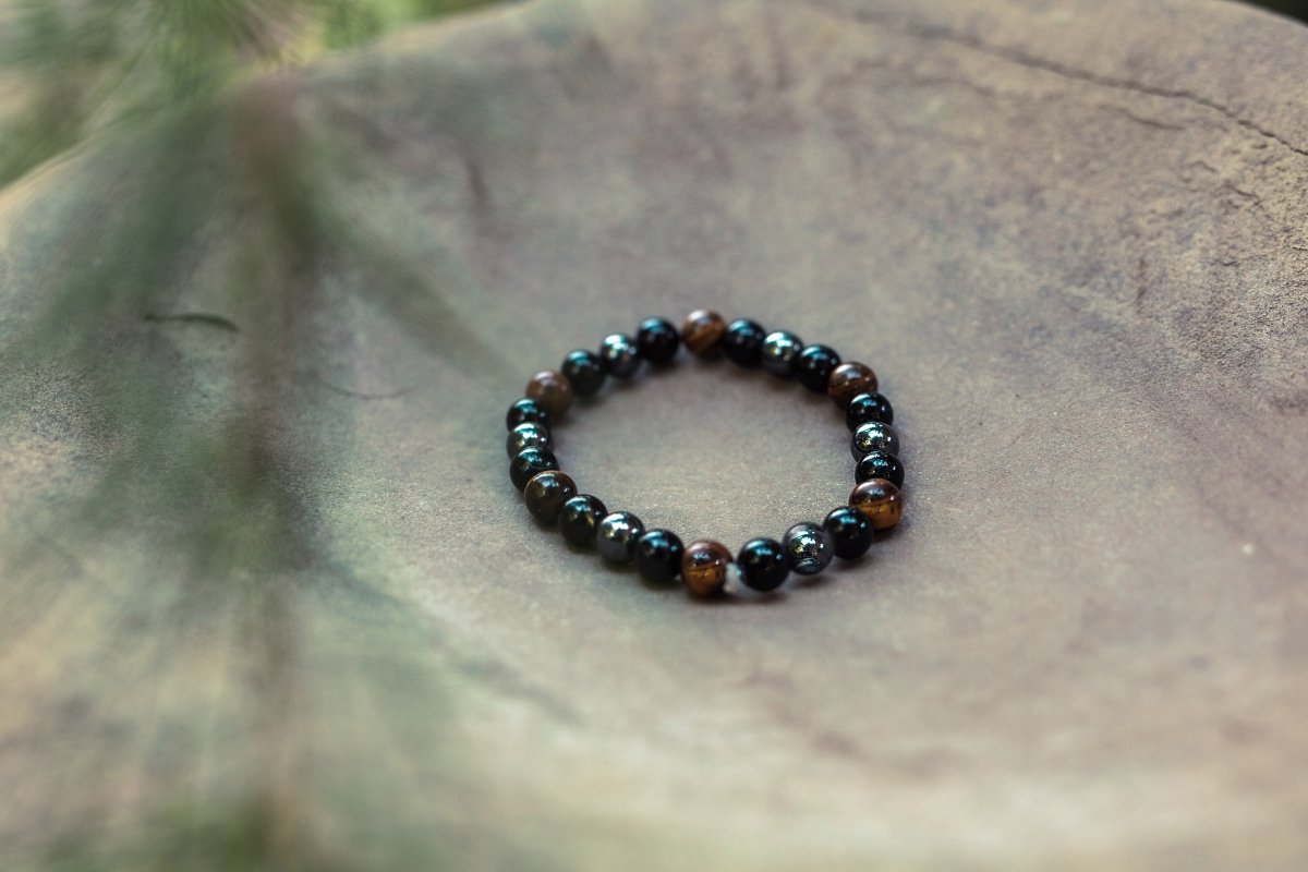 Ancient Energy triple protection bracelet with tiger's eye, hematite, and obsidian beads, 7.5 inches long.