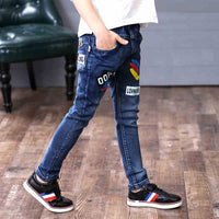 Boys' velvet one-piece jeans for autumn and winter by Ancient Energy, featuring warm, cozy fabric and casual style.