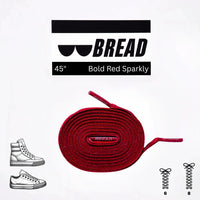 Bold red elastic shoelace by Bread, featuring stretchy, durable design ideal for casual and athletic footwear.