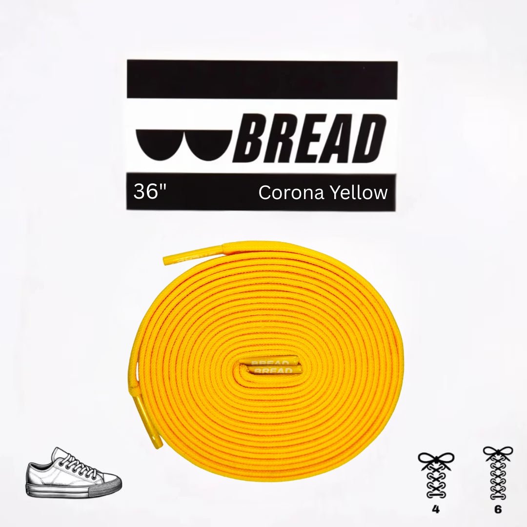 Yellow elastic shoelace by Bread, designed for easy slip-on footwear, with a vibrant Corona yellow color.