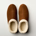 Cozy women's suede slipper from Bread's Ashton Edition, featuring soft, plush interior and stylish design for comfortable indoor wear.