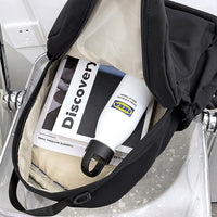 Ancient Energy nylon school backpack for junior high students, featuring multiple compartments and adjustable shoulder straps.
