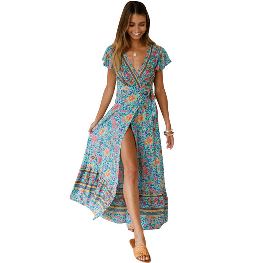 Mandotos International Tropical Bloom Maxi Dress with vibrant floral pattern and flowing fabric, perfect for summer occasions.