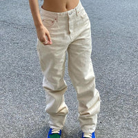 European and American slim fashion jeans for women by Ancient Energy, showcasing a fitted denim style in a casual pose.