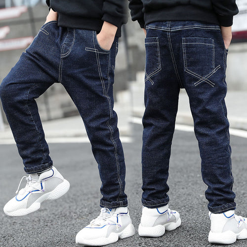 Boys' velvet one-piece jeans for autumn and winter from Ancient Energy, featuring a cozy, stylish design with pockets and soft fabric.