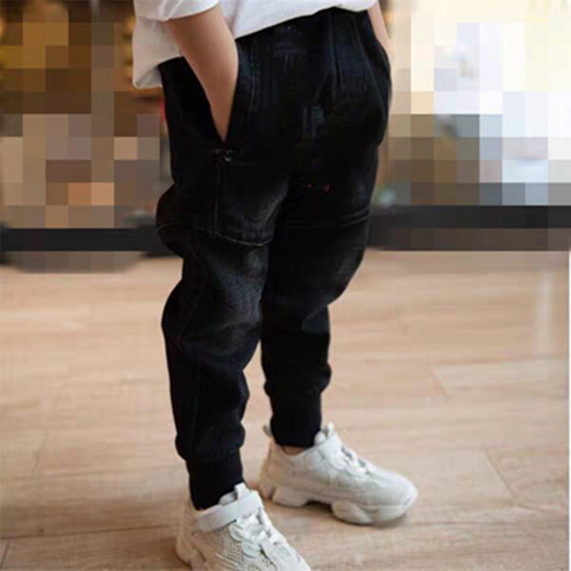 Kids black jeans by Ancient Energy, single spring and autumn boys' pants, shown on a child, casual and comfortable fit.