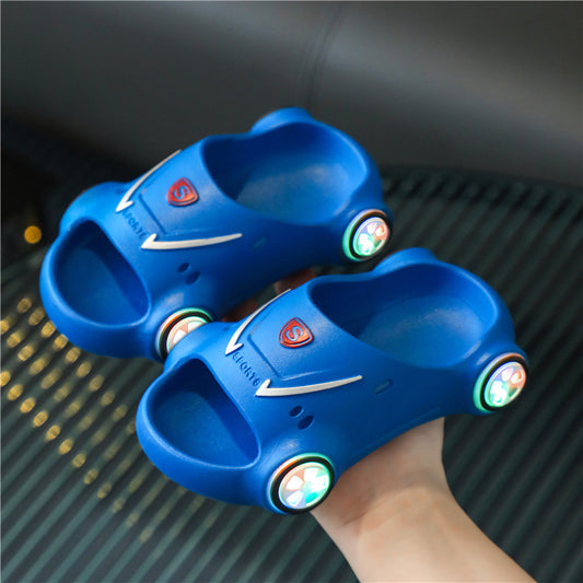 Kids glowing cartoon car slippers by Ancient Energy, luminous children's slip-on sandals with anti-slip soles for summer beach fun.