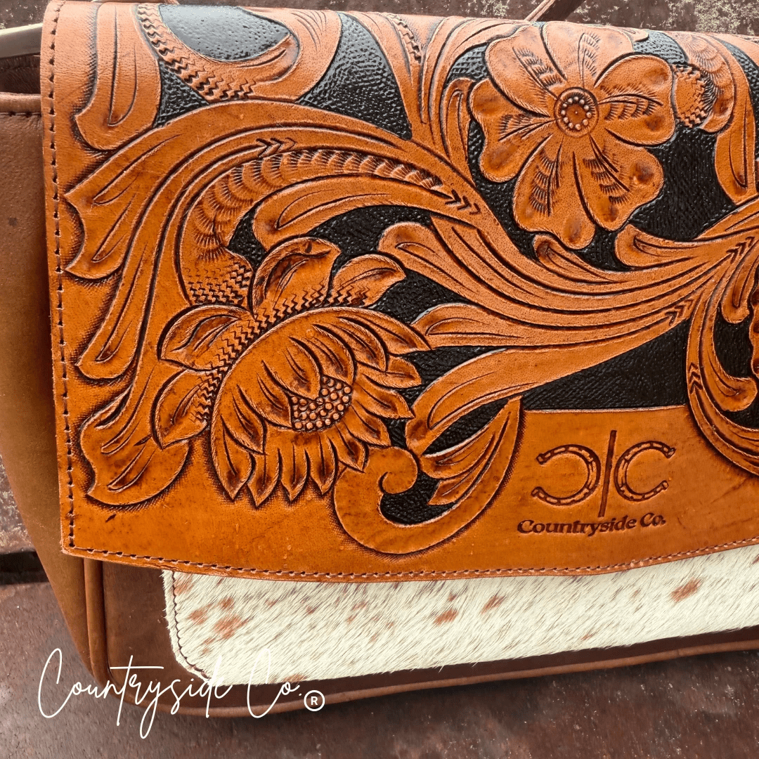 Grace Tooled Leather Purse by Countryside Co. featuring detailed floral tooling and a classic leather finish.