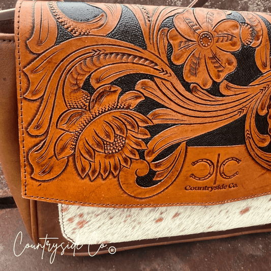Grace Tooled Leather Purse by Countryside Co. featuring detailed floral tooling and a classic leather finish.