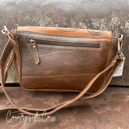 Grace Tooled Leather Purse by Countryside Co. featuring detailed embossed leather, compact size, and antique finish.