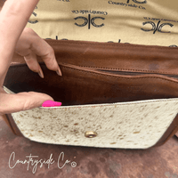 Grace Tooled Leather Purse by Countryside Co. featuring intricate tooling, a compact design, and a stylish leather finish.