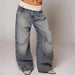 Women’s loose-fitting straight-leg jeans by Ancient Energy with pockets, casual street-style trousers in denim fabric.