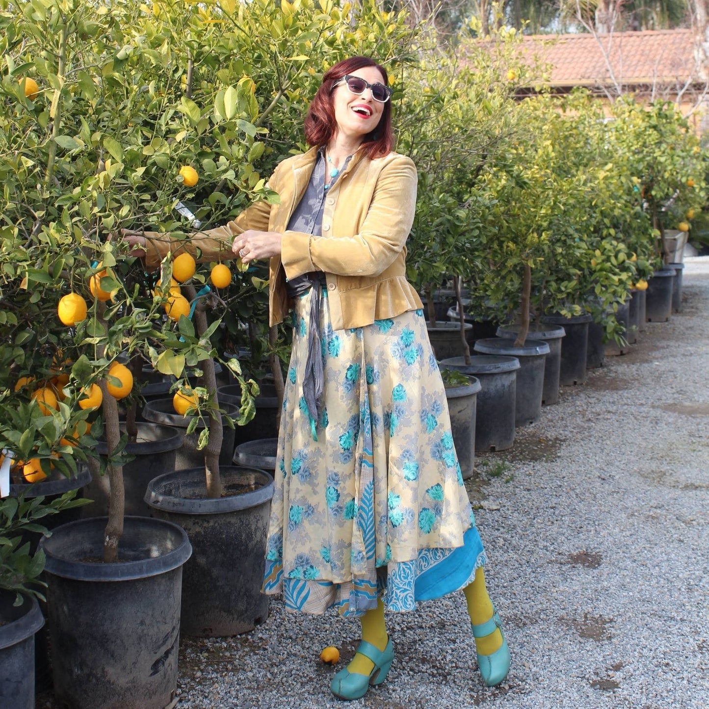 Darn Good Yarn The Original Sari Wrap Skirt in vibrant, colorful sari fabric with tie closure, stylish and versatile clothing accessory.