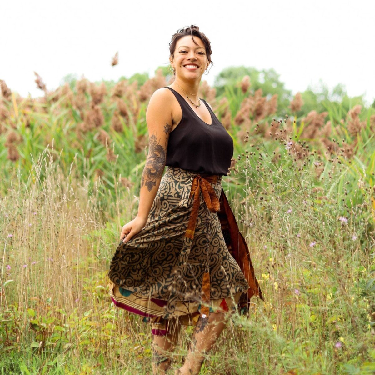 Colorful sari wrap skirt by Darn Good Yarn, featuring vibrant fabric and a stylish, versatile design for boho-inspired fashion.