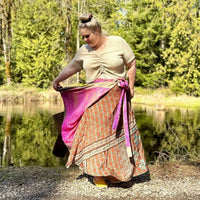 Colorful sari wrap skirt by Darn Good Yarn, showcasing vibrant fabric and traditional handwoven design.